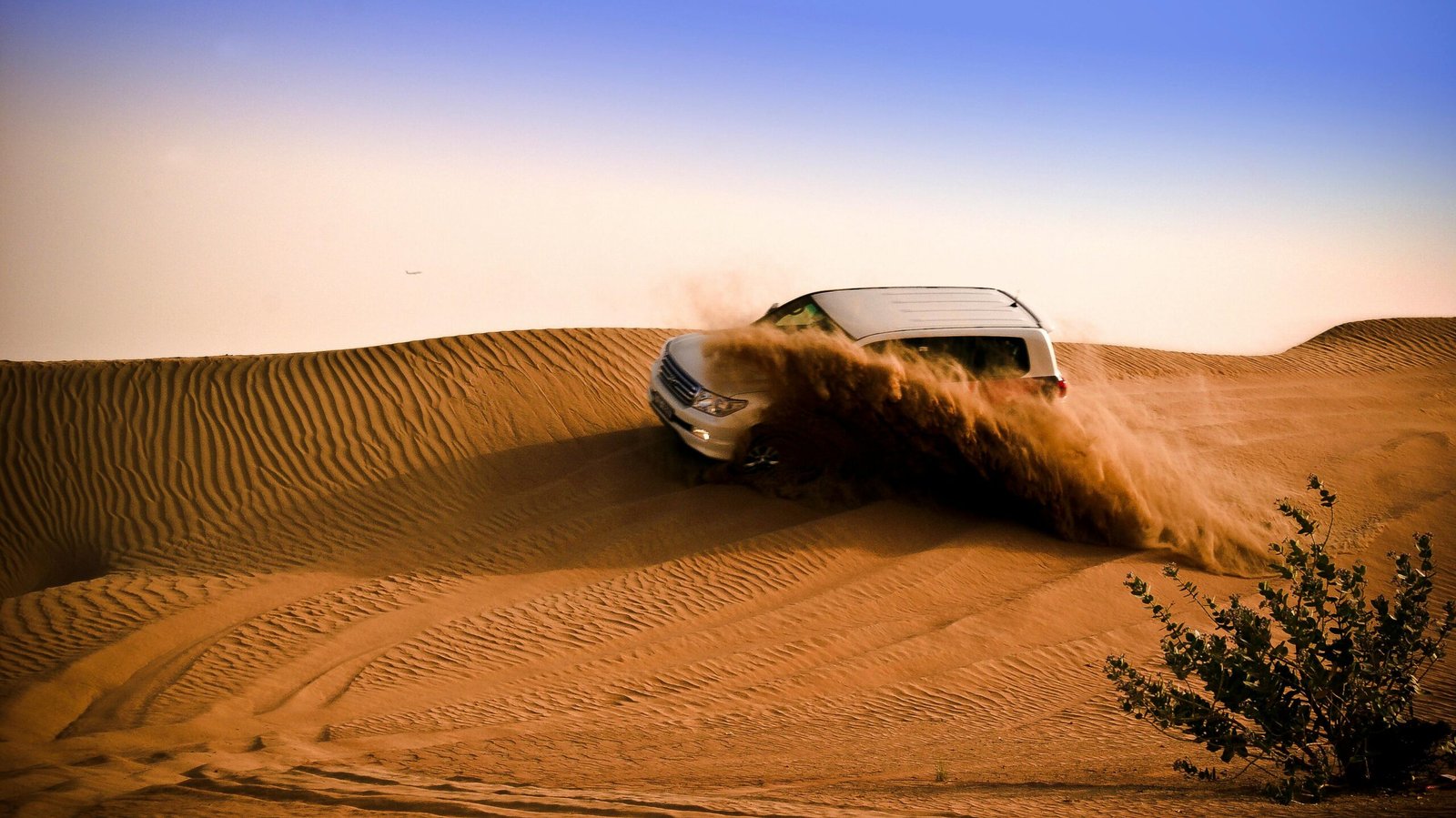 A LAND CRUISER IN DESERT